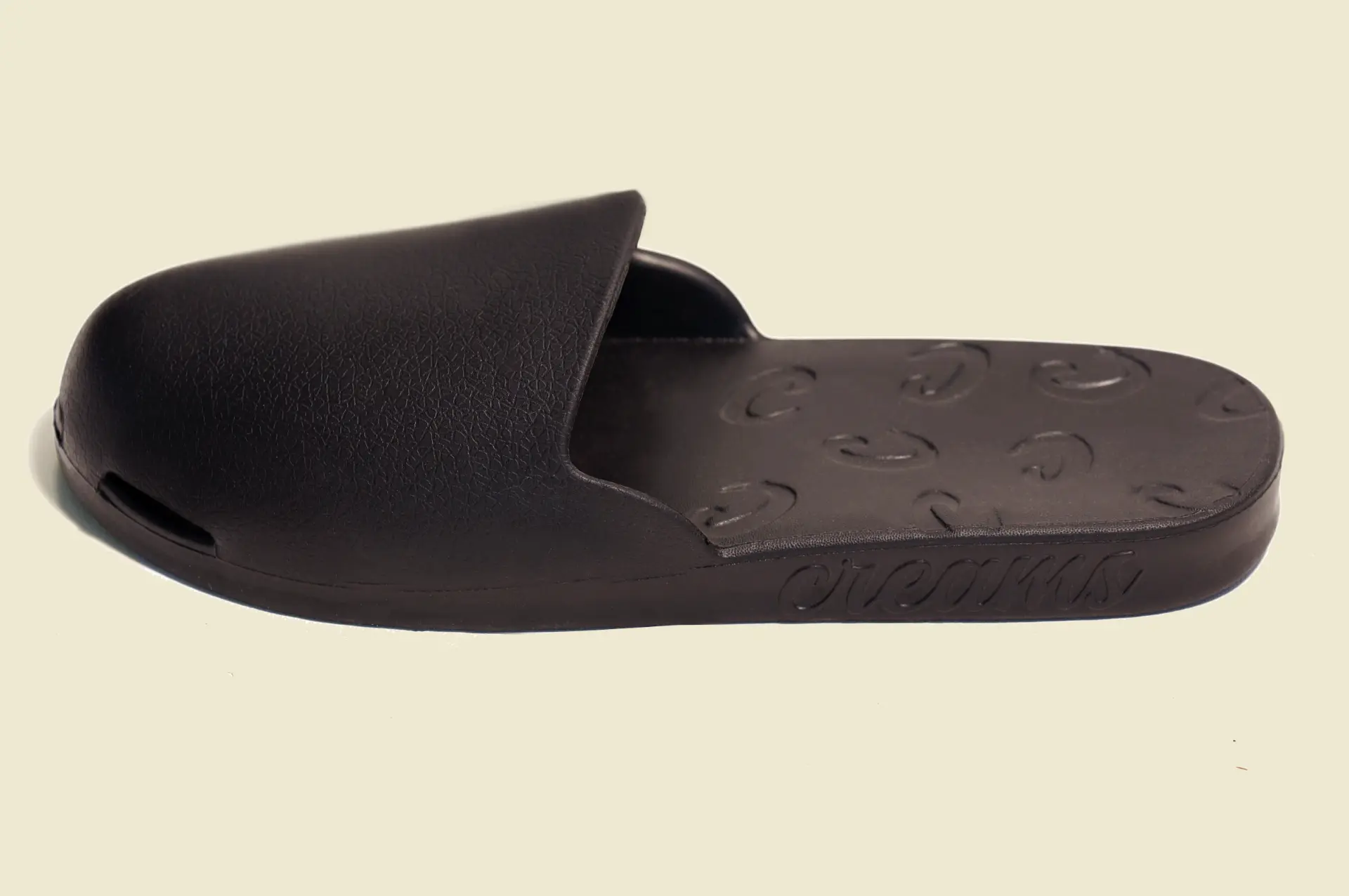 Black Creams slide, side profile