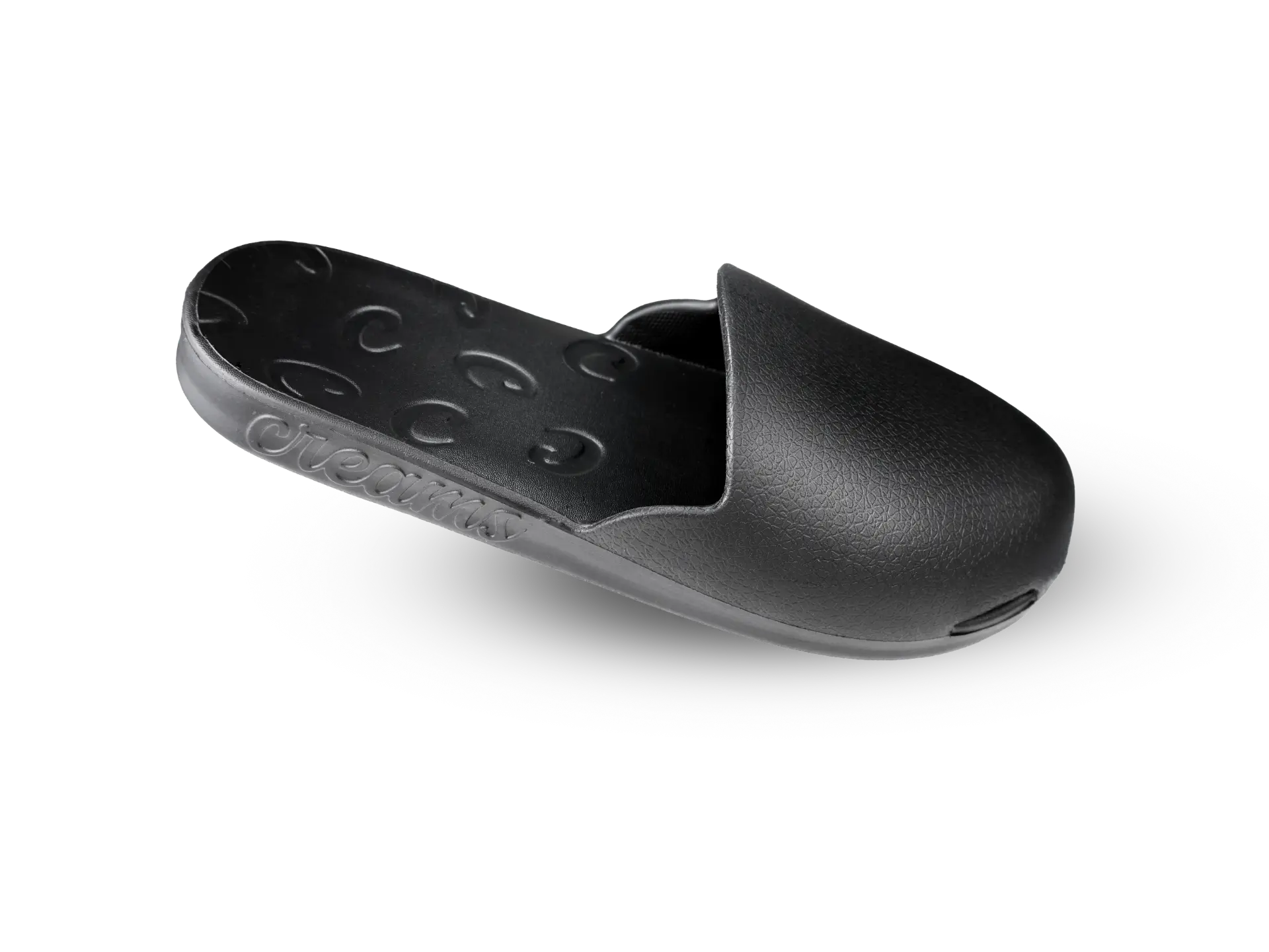 Black Creams closed-toe slide, angled view
