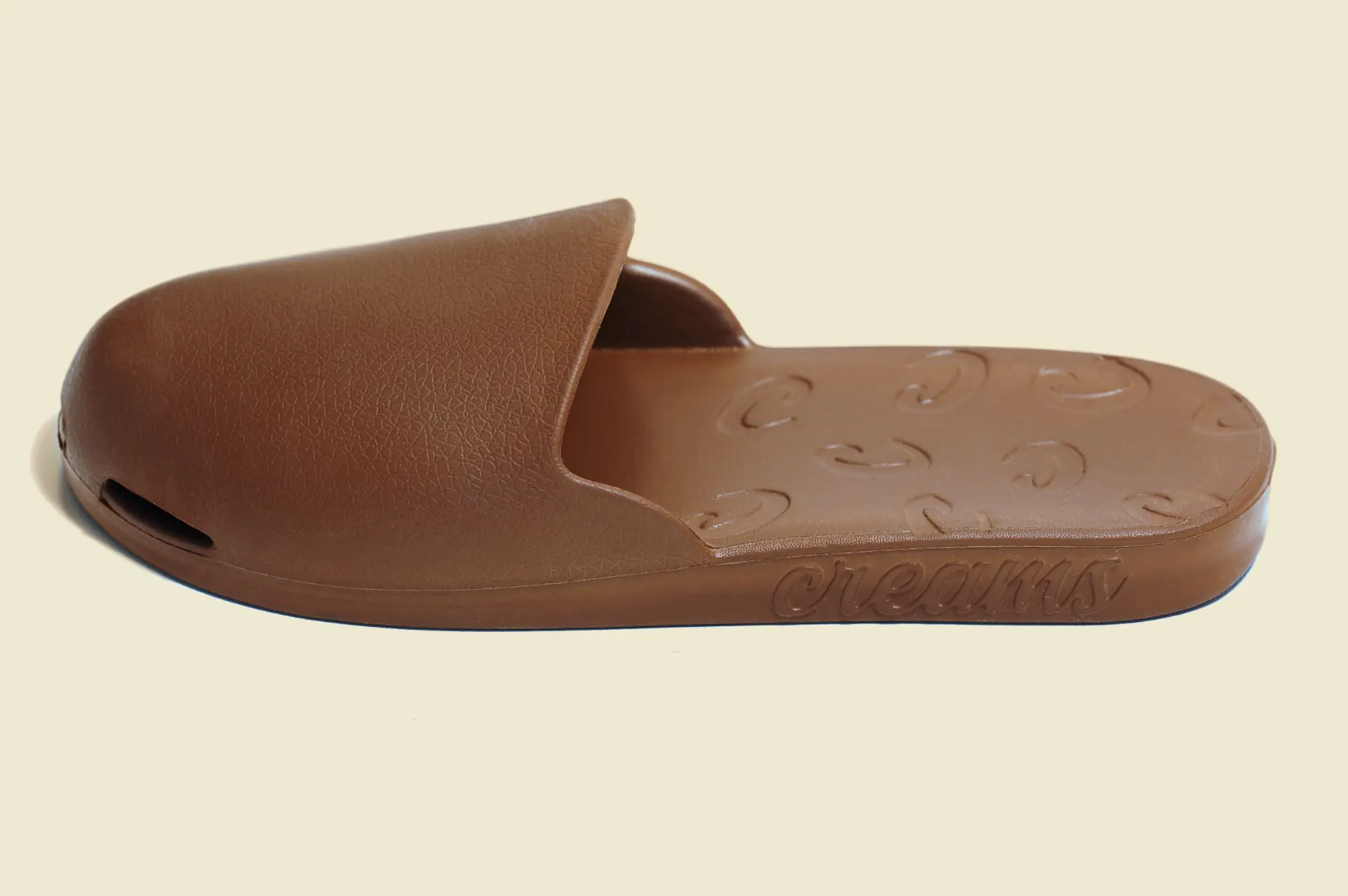Brown Creams slide, side profile